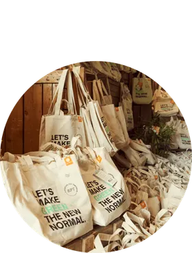 A room filled with custom tote bags
