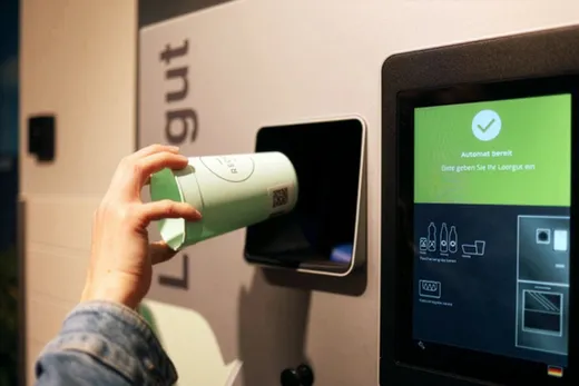 Ein REWE Pfandautomat mit einem RECUP
