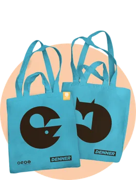 Two turquoise tote bags with custom prints by denner