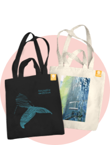 Two different tote bags with ocean-themed designs