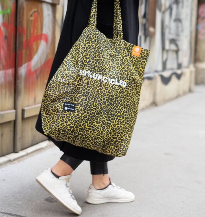An example of an upcycled bag with a leopard pattern design